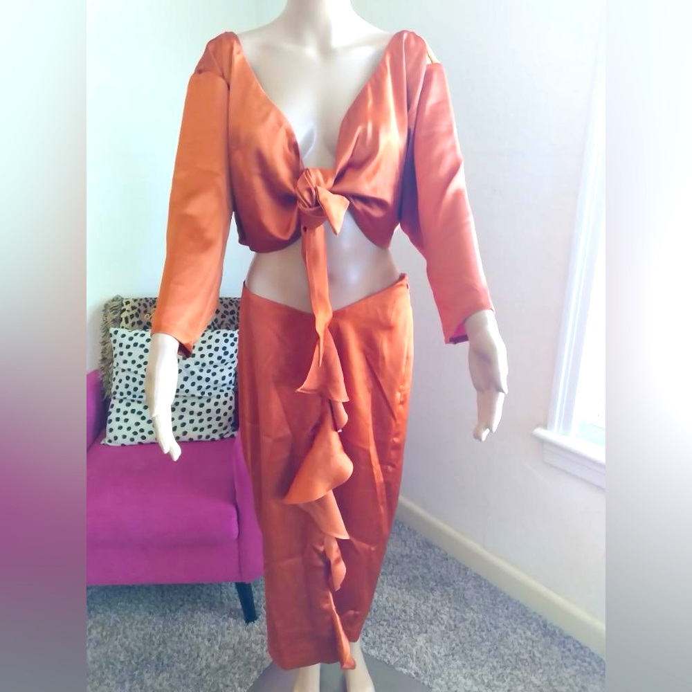 by Egreis 2 piece set. Heavy Satin material. Adjustable tie up crop top. NEW!